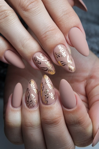 Classic Nude Almond Matte Nails with Gold Accents