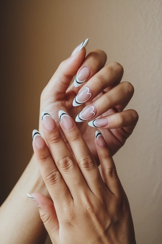 Minimalist Heart French Tips on Almond Nails