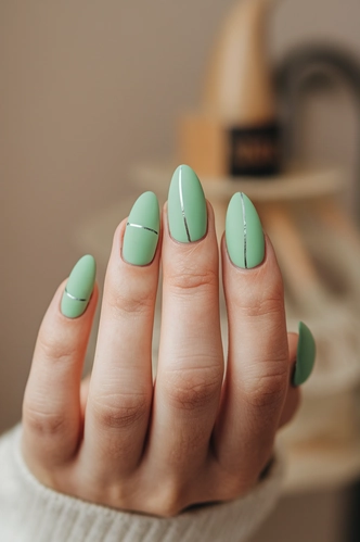 Mint Green Matte Almond Nails with Silver Lines