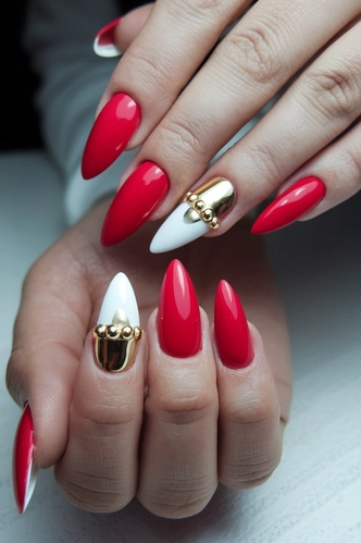 Red Stiletto Medium Nails with Gold Accents